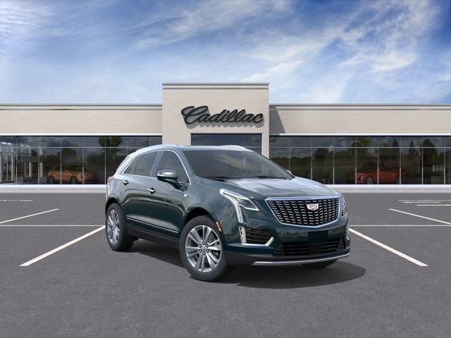 2026 Cadillac XT5 Premium Luxury in Emerald Lake Metallic — front three-quarter view