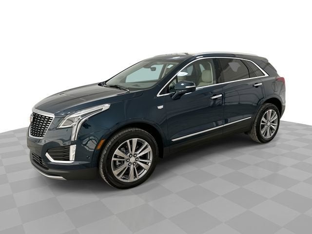 2026 Cadillac XT5 Premium Luxury in Emerald Lake Metallic — front three-quarter view
